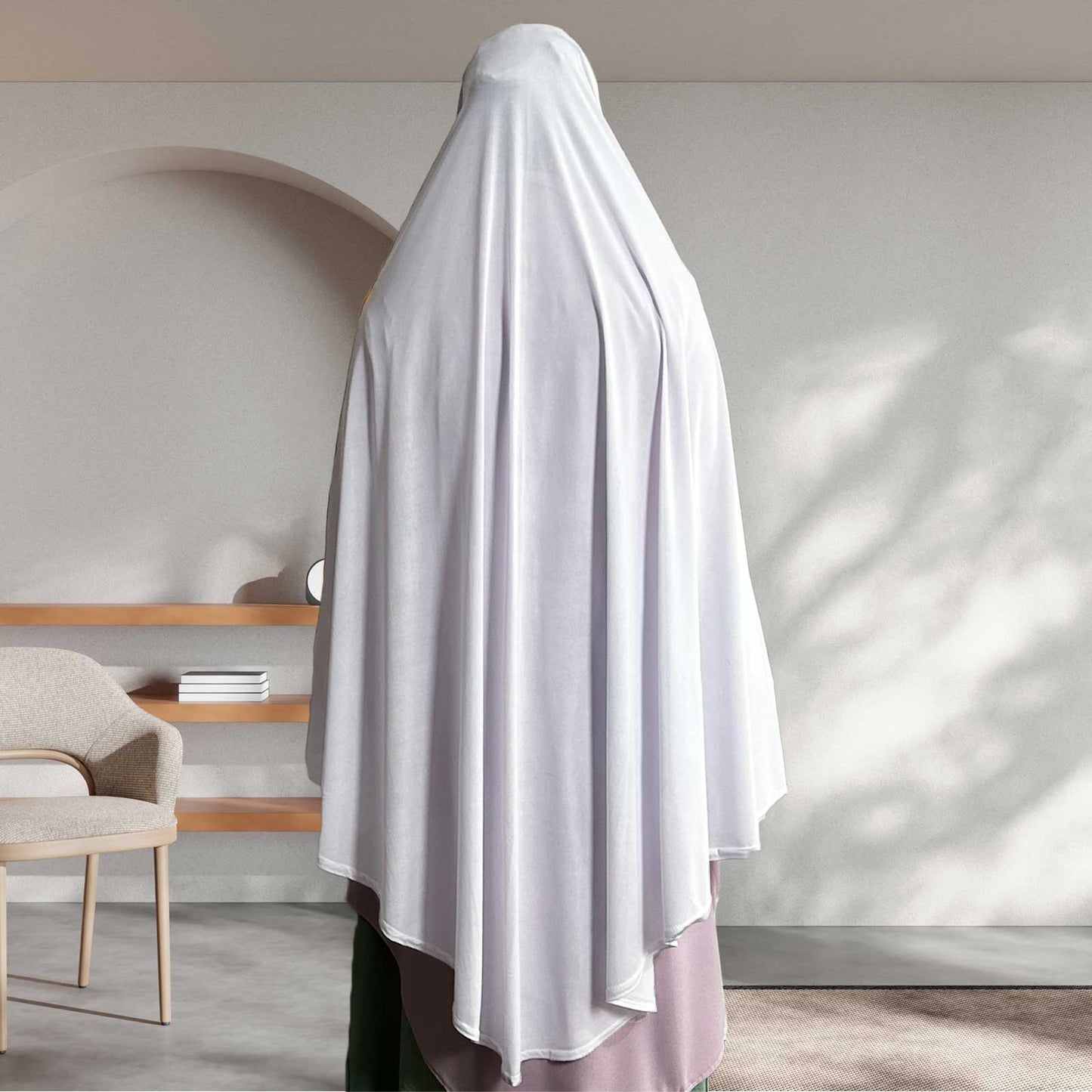 prayer hijab measures 48-in long on the front, 52-in long on the back